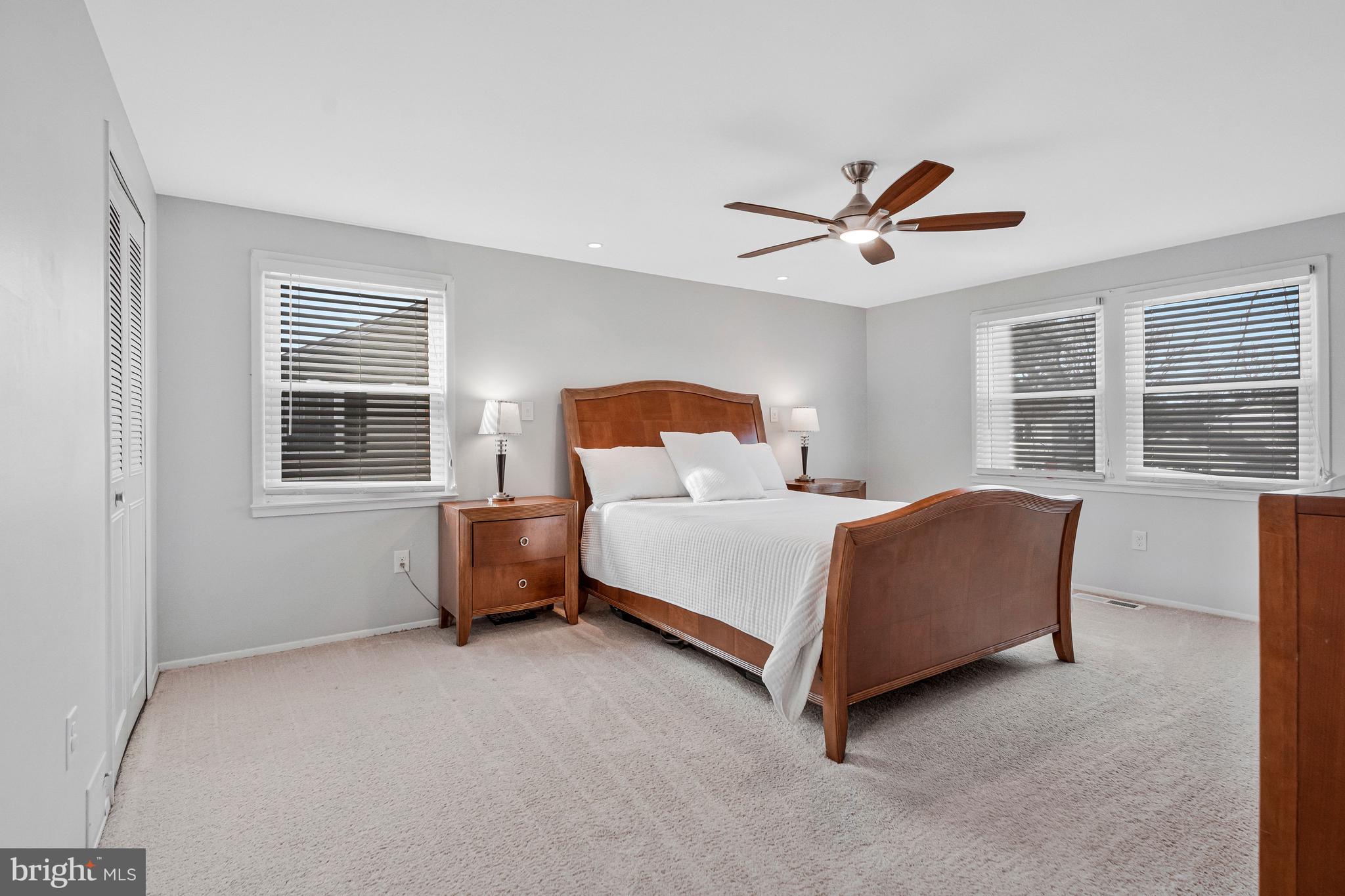 13127 Parson Lane Fairfax, VA 22033 - Photo 25 of 44 a bedroom with a bed and a large window