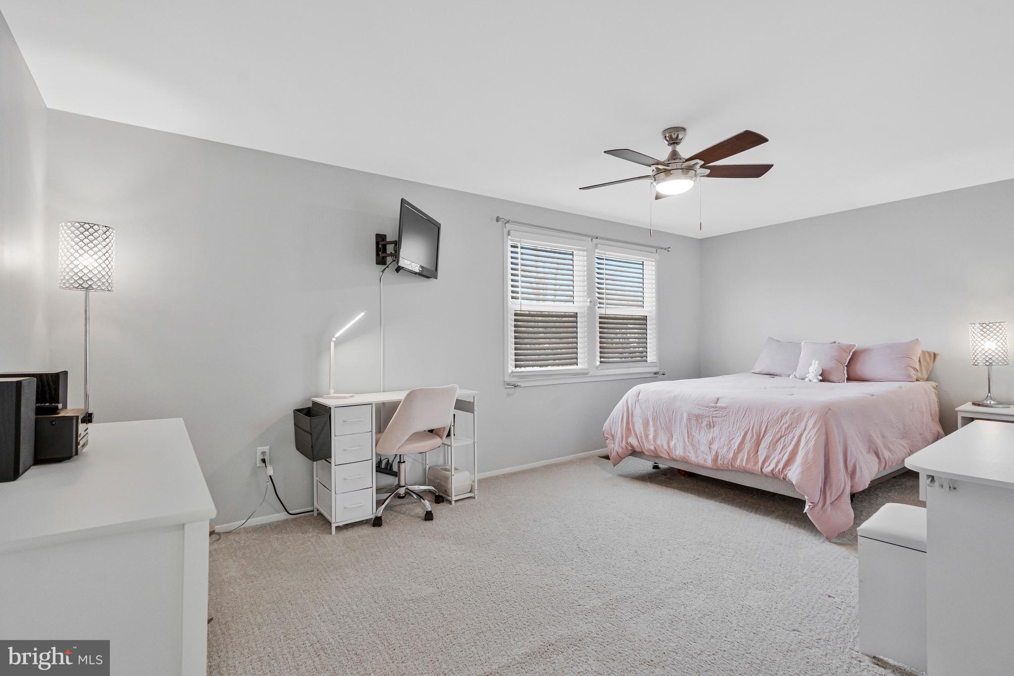 13127 Parson Lane Fairfax, VA 22033 - Photo 31 of 44 a bedroom with a bed and a window