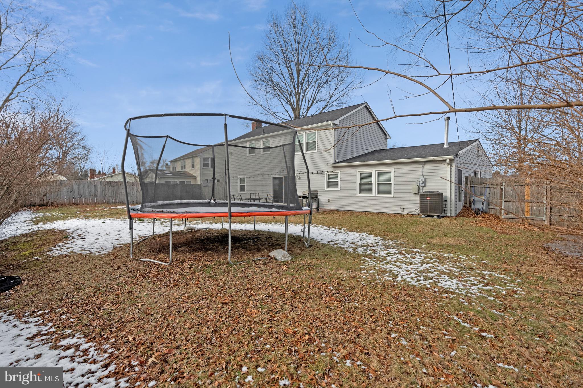 13127 Parson Lane Fairfax, VA 22033 - Photo 40 of 44 a backyard of a house with table and chairs