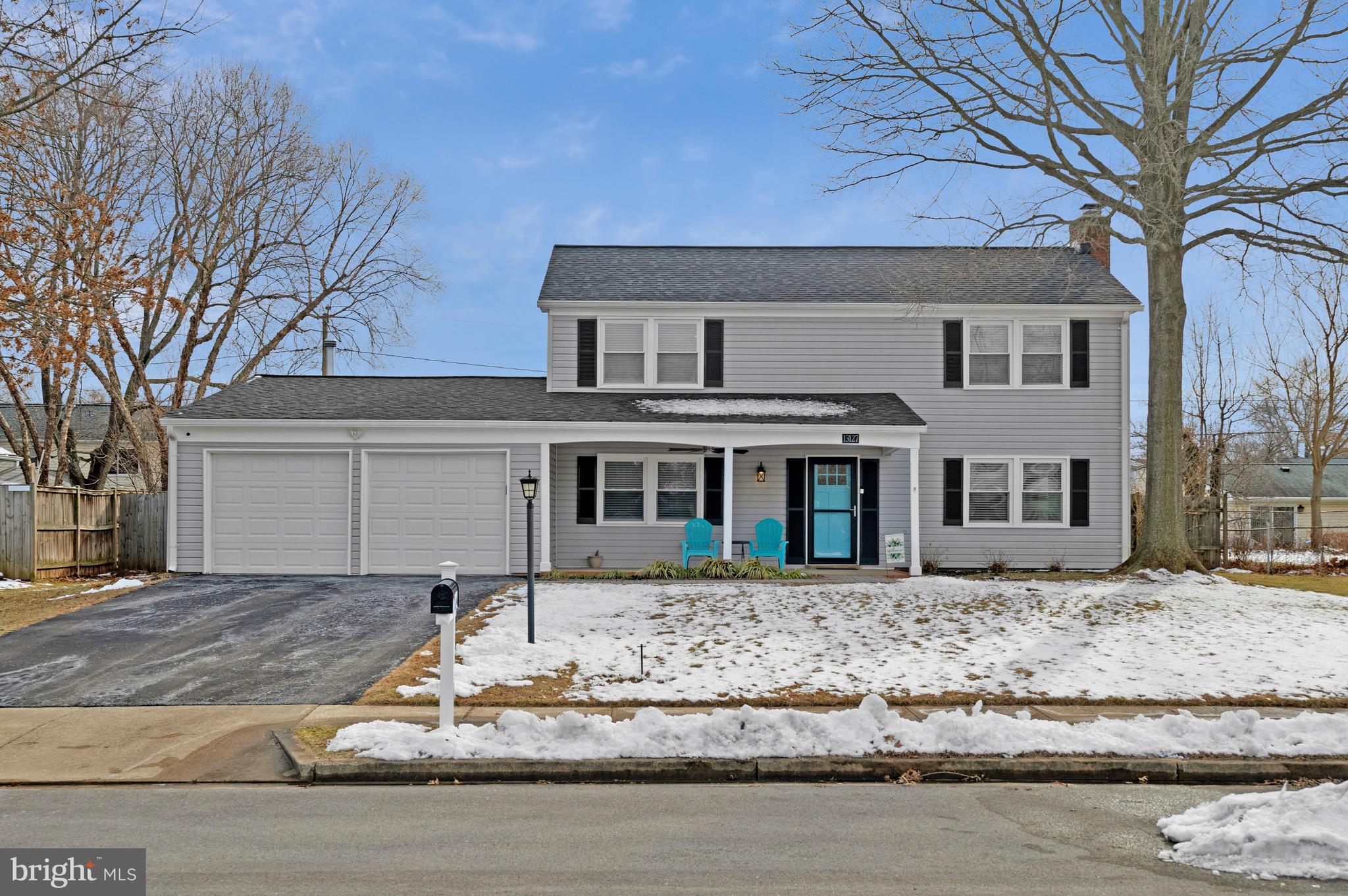 13127 Parson Lane Fairfax, VA 22033 - Photo 4 of 44 a front view of a house with a yard