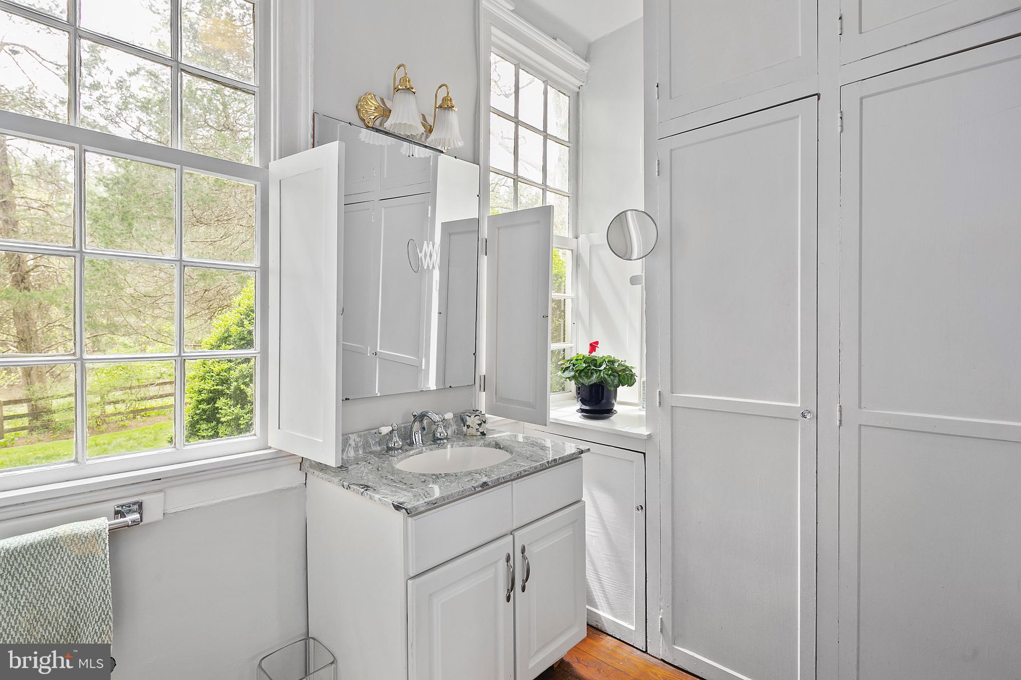 1213 Towlston Road McLean, VA 22102 - Photo 26 of 50 Main lvl updated full bath w/lg shuttered windows