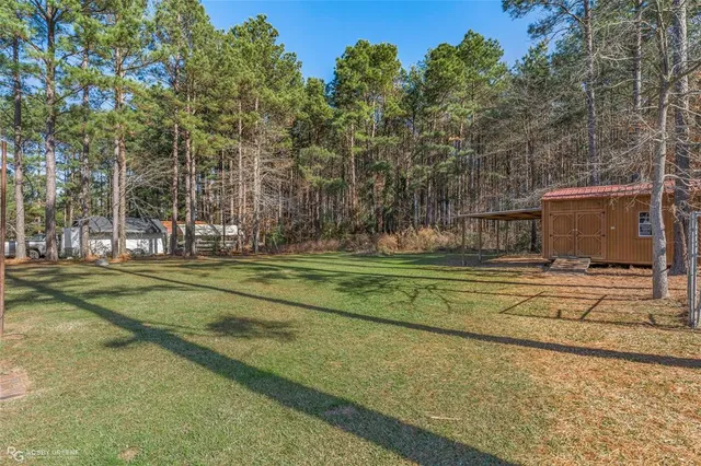 a view of a playground with basketball court