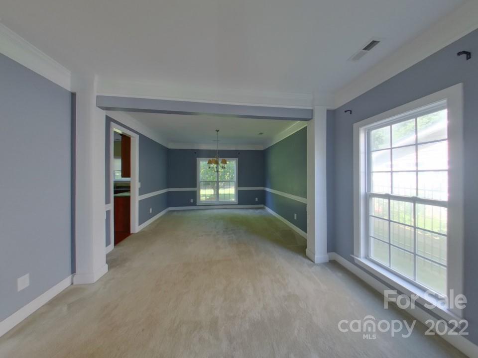 2434 Blueberry Ridge Road Matthews, NC 28105 - Photo 3 of 21 a view of empty room with windows