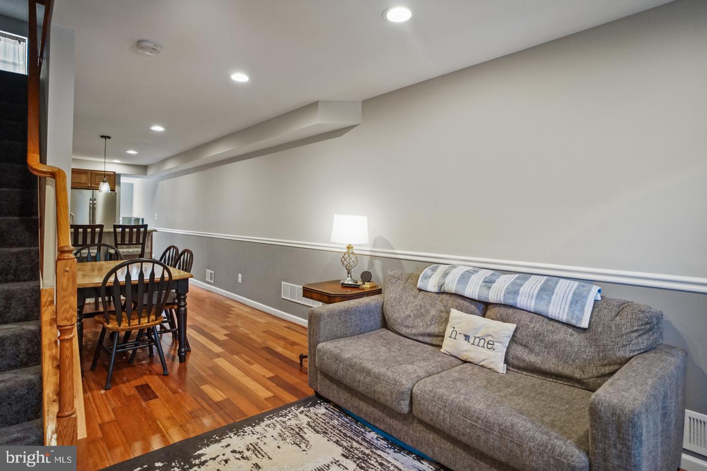 1421 Race Street Baltimore, MD 21230 - Photo 5 of 16 a living room with furniture and wooden floor