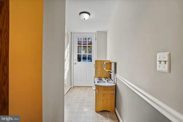 a view of storage and utility room with washer and dryer