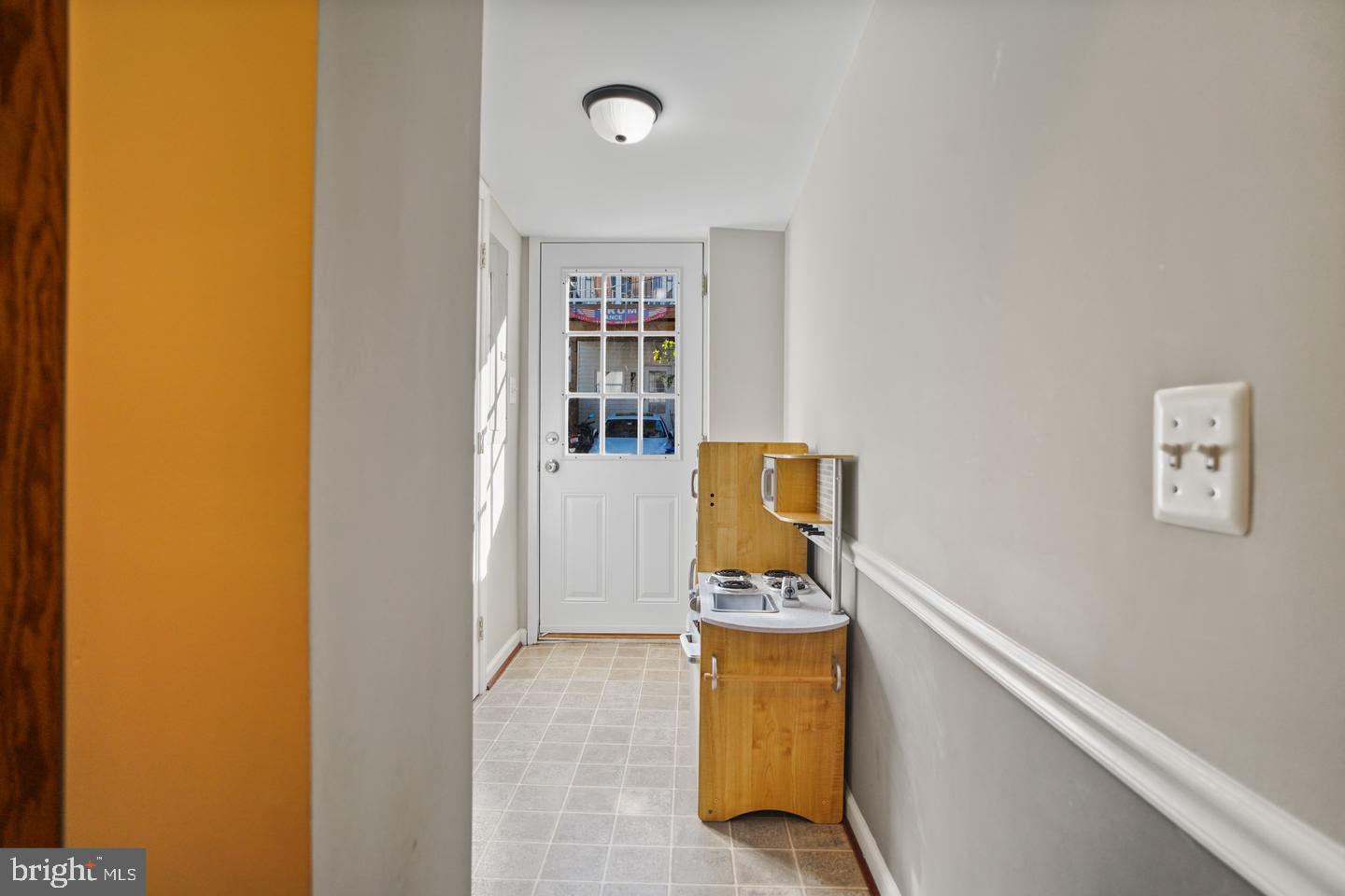 1421 Race Street Baltimore, MD 21230 - Photo 9 of 16 a view of storage and utility room with washer and dryer
