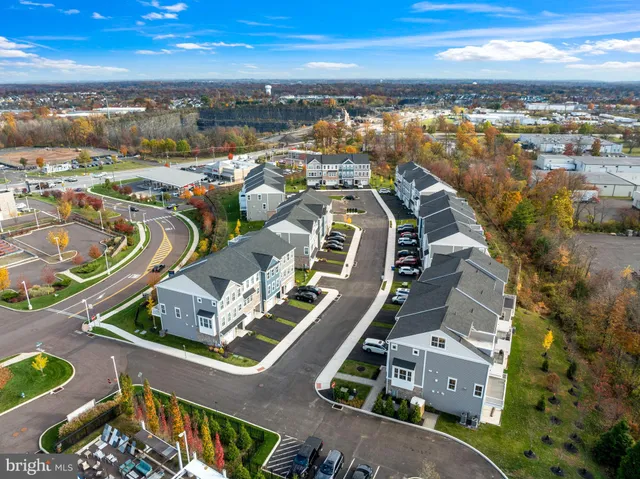 an aerial view of a house with outdoor space