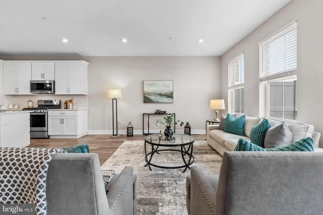 a living room with furniture and a living room