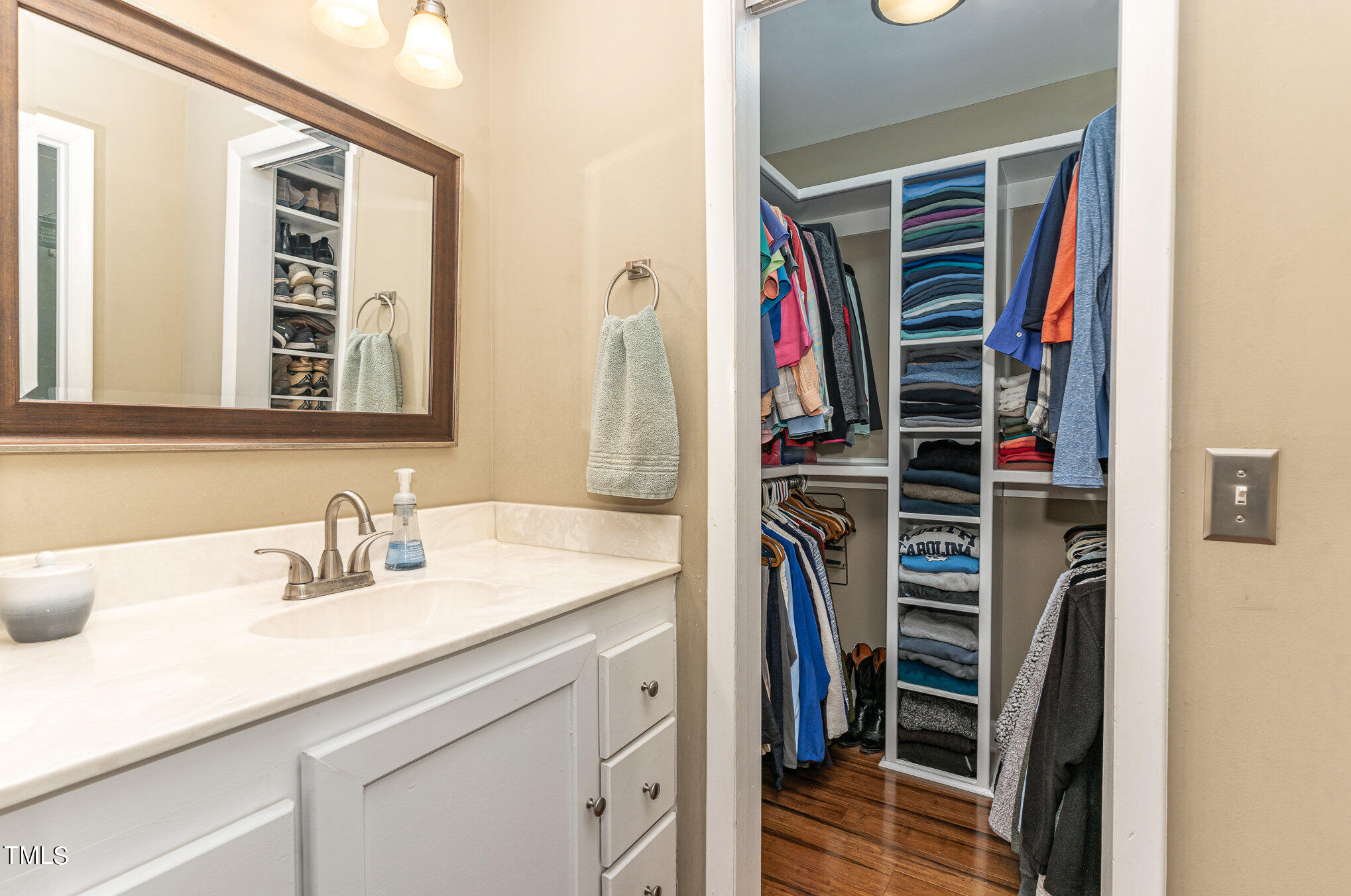 529 Ashebrook Drive Raleigh, NC 27609 - Photo 16 of 35 a view of walk in closet with clothes