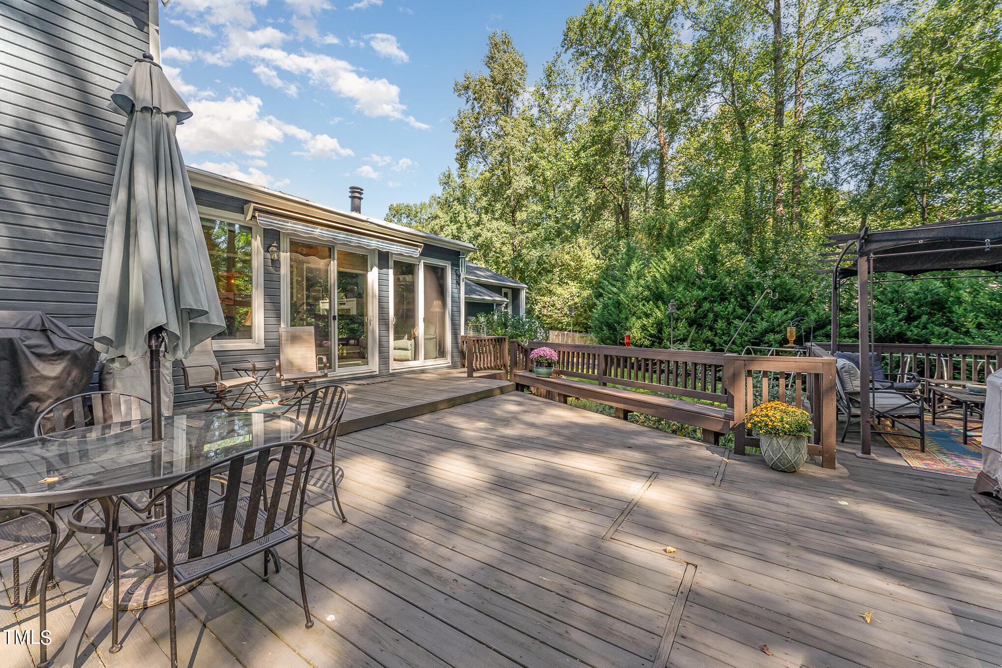 529 Ashebrook Drive Raleigh, NC 27609 - Photo 26 of 35 a view of a chair and table in the patio