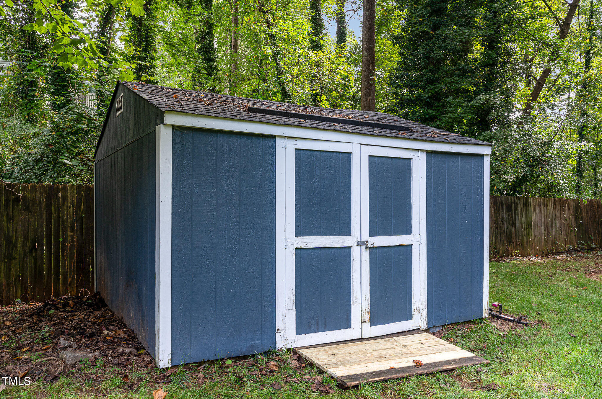 529 Ashebrook Drive Raleigh, NC 27609 - Photo 27 of 35 a view of backyard with green space