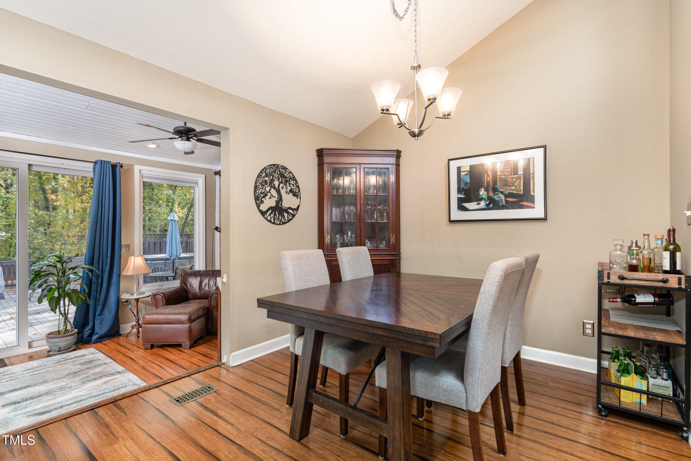529 Ashebrook Drive Raleigh, NC 27609 - Photo 8 of 35 a view of a dining room with furniture window and wooden floor