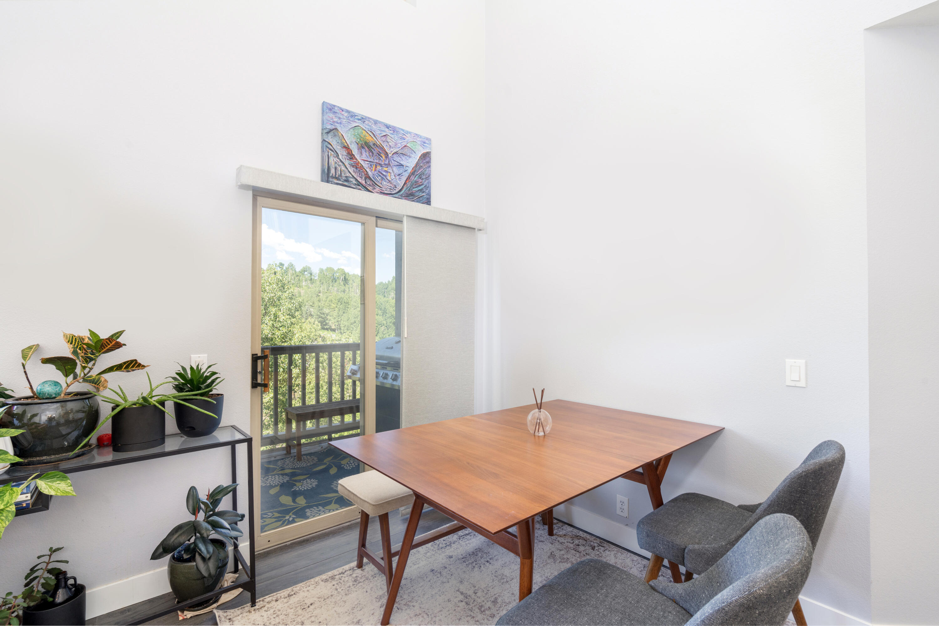 327 Adams Ranch Road, Unit 102 Mountain Village, CO 81435 - Photo 5 of 21 Dining & Balcony Access