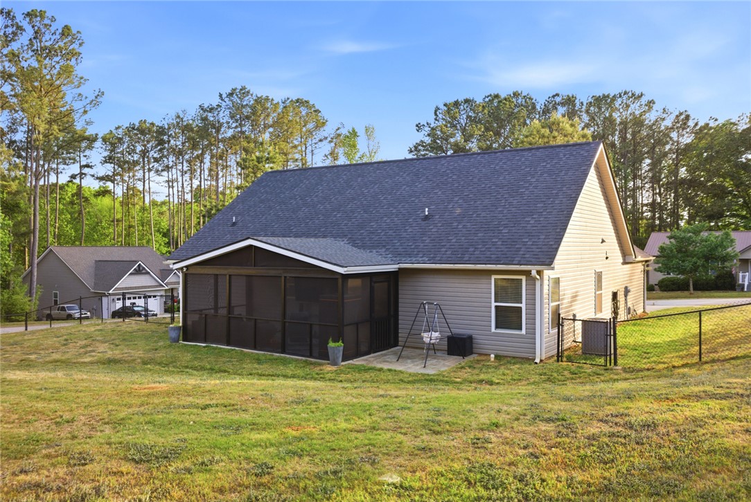 400 Green View Court Westminster, SC 29693 - Photo 29 of 33 This home features a serene screened porch and a spacious yard, perfect for outdoor enjoyment.