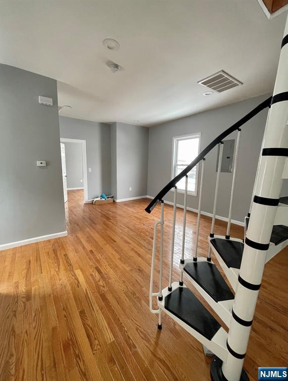 345 Kaplan Avenue, Unit 2 Hackensack, NJ 07601 - Photo 7 of 14 a view of entryway with wooden floor