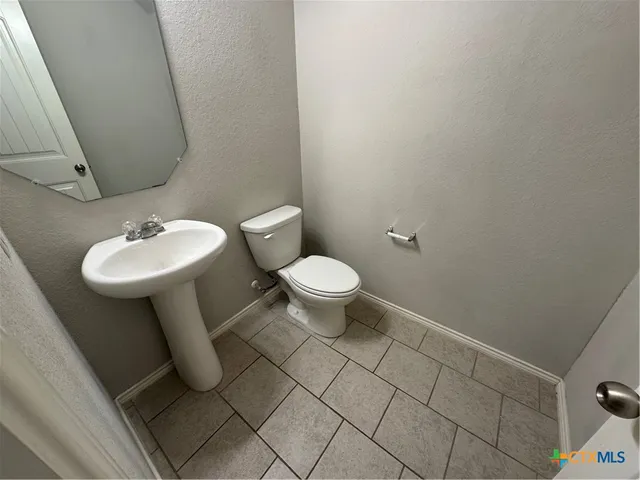 a living room with a couch and a flat screen tv