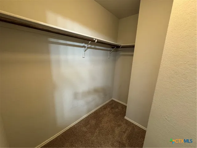 a bathroom with a sink a toilet and bathtub