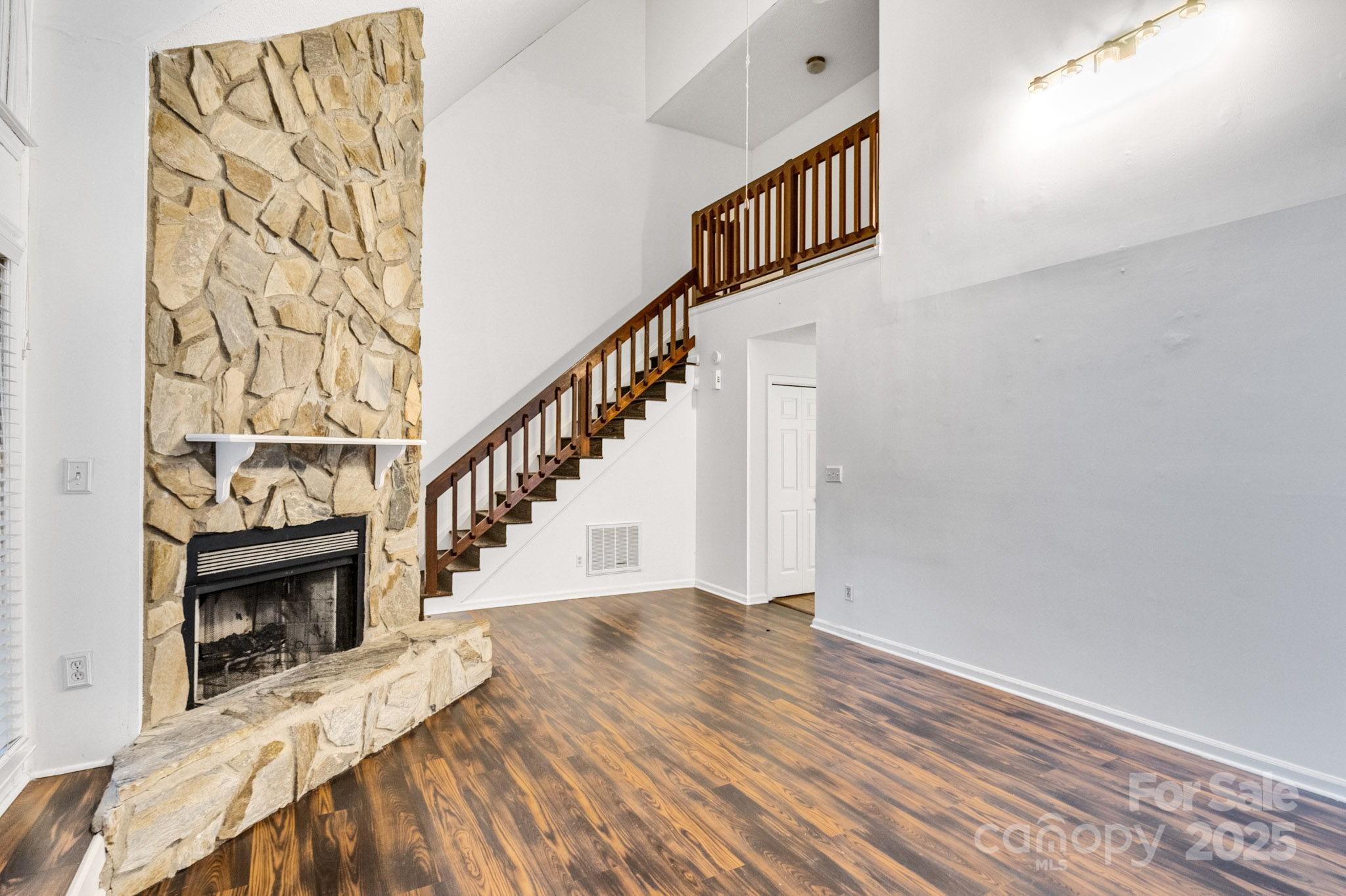 27097 Cove Lane Tega Cay, SC 29708 - Photo 11 of 30 a view of entryway and hall with wooden floor