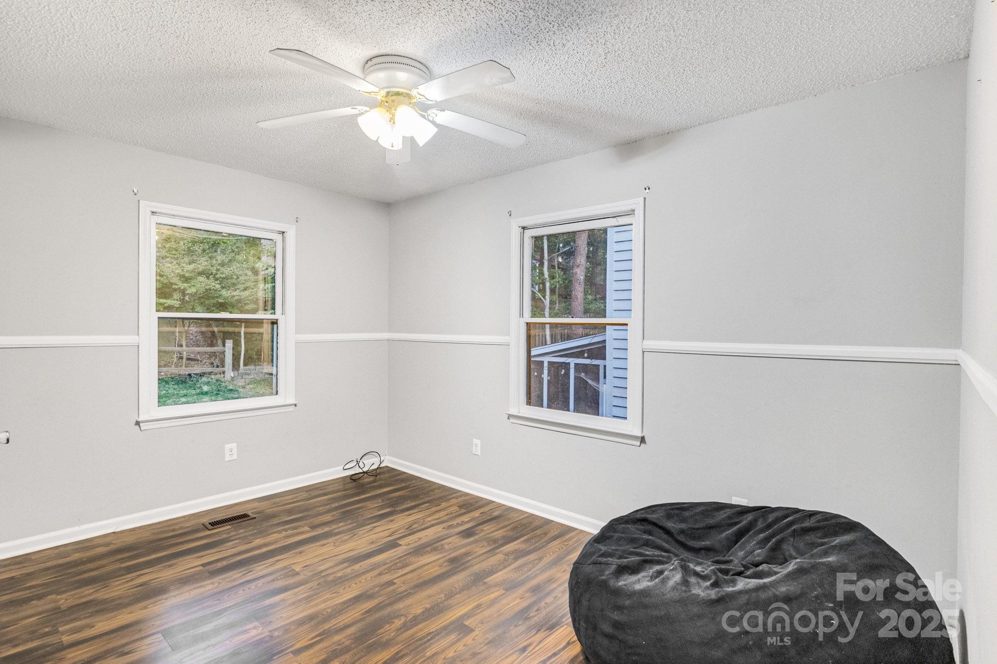 27097 Cove Lane Tega Cay, SC 29708 - Photo 16 of 30 a view of a livingroom with a window