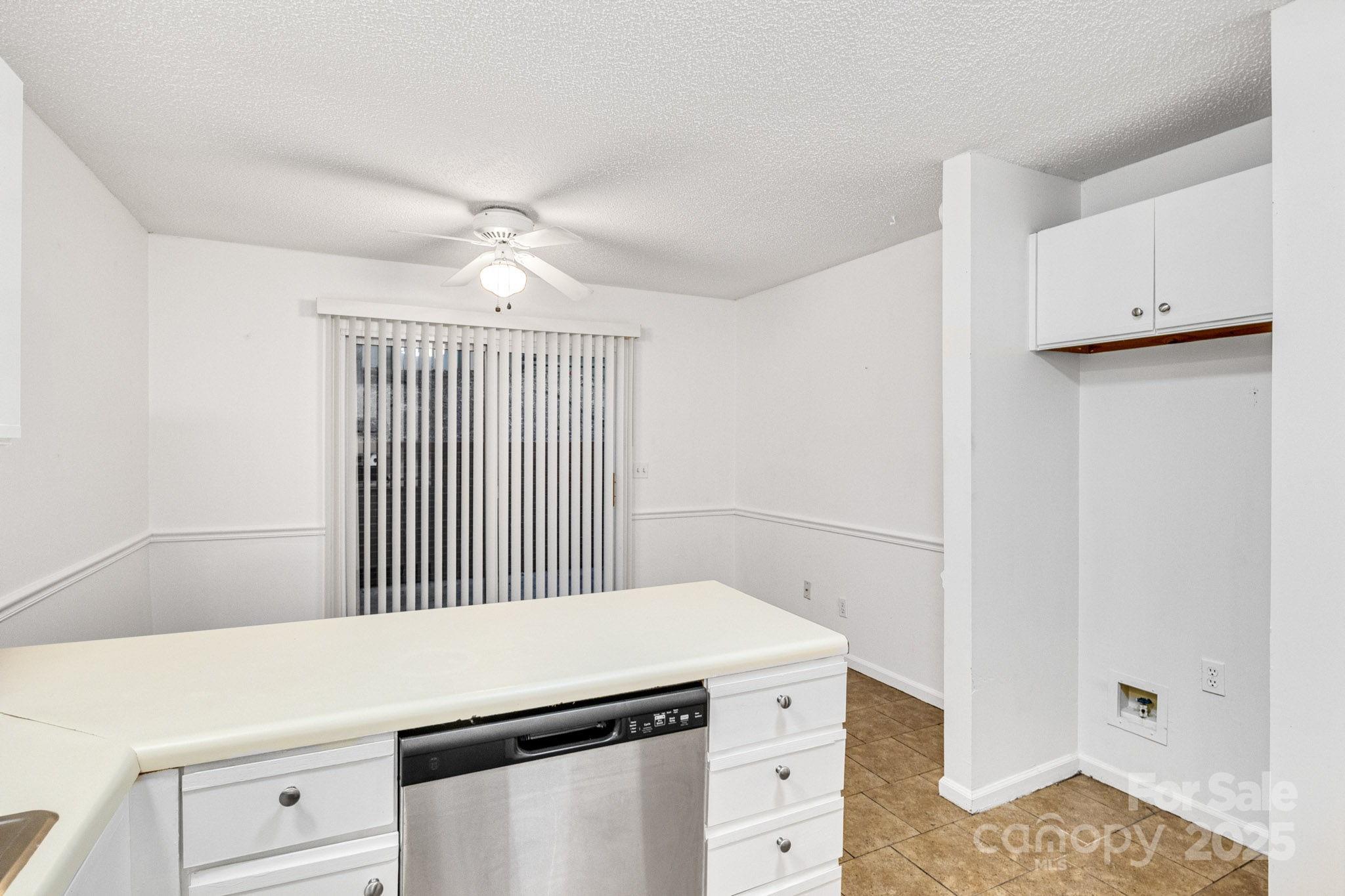 27097 Cove Lane Tega Cay, SC 29708 - Photo 27 of 30 a utility room with dryer and washer