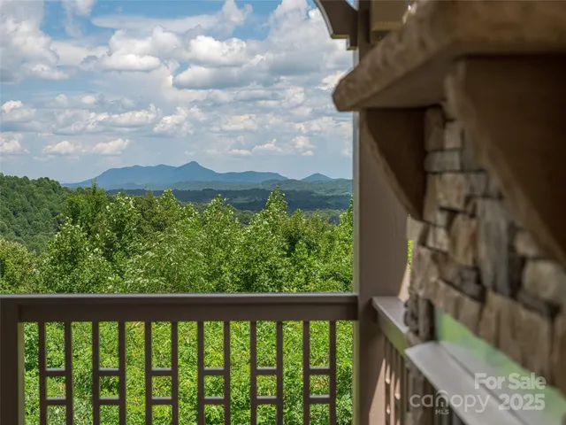 a view of a balcony with an outdoor space