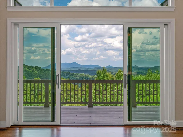 a view of a bench in front of a door