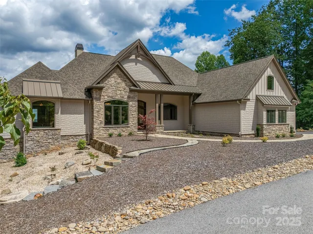 a view of a yard in front of a house
