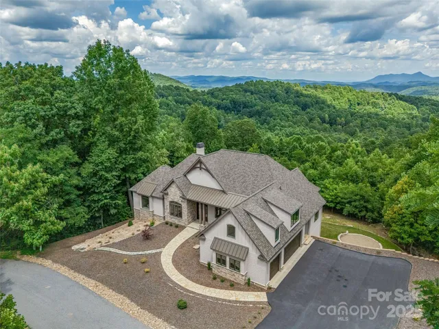 a view of a house with a sink and a yard