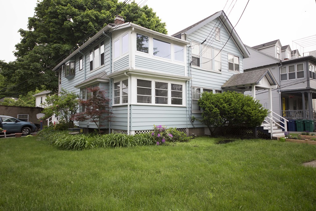 4 Nottingham Street, Unit 2 Newton, MA 02459 - Photo 2 of 18 a house view with a garden space