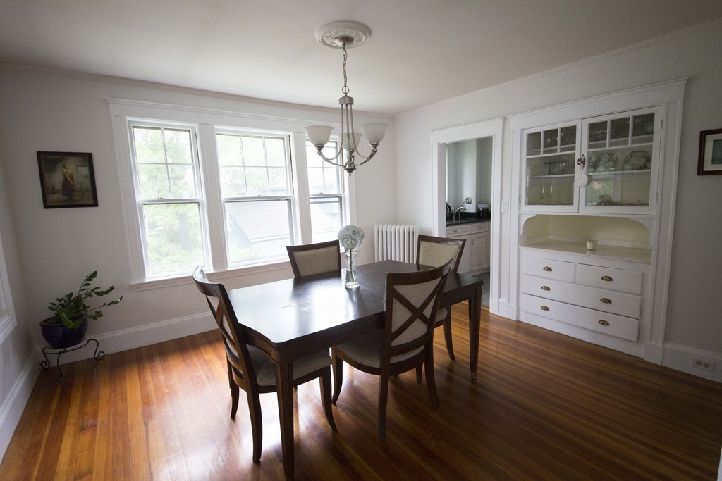 4 Nottingham Street, Unit 2 Newton, MA 02459 - Photo 5 of 18 a view of a dining room with furniture window and wooden floor