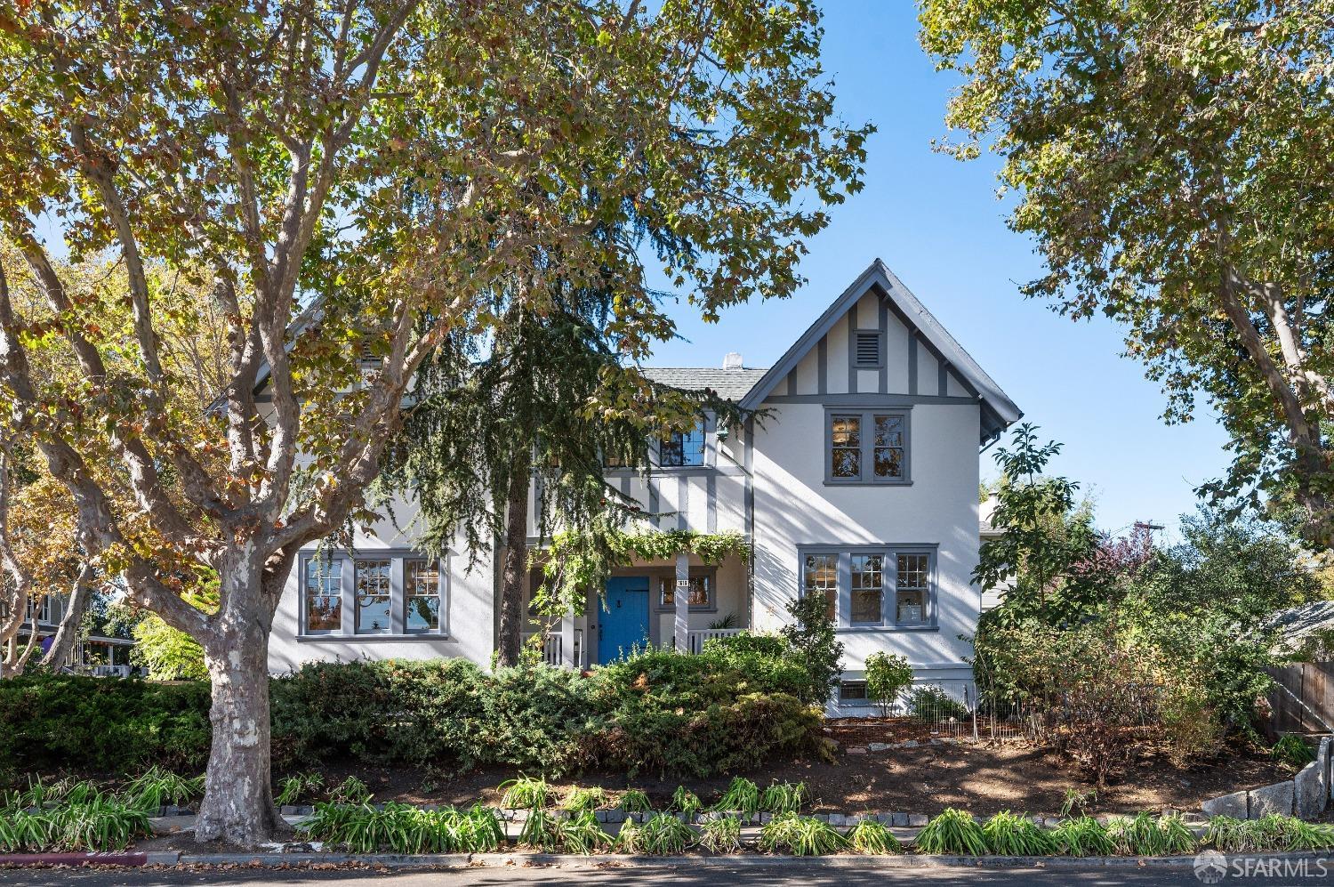 1616 Adeline Drive Burlingame, CA 94010 - Photo 1 of 67 a front view of a house with a yard and potted plants
