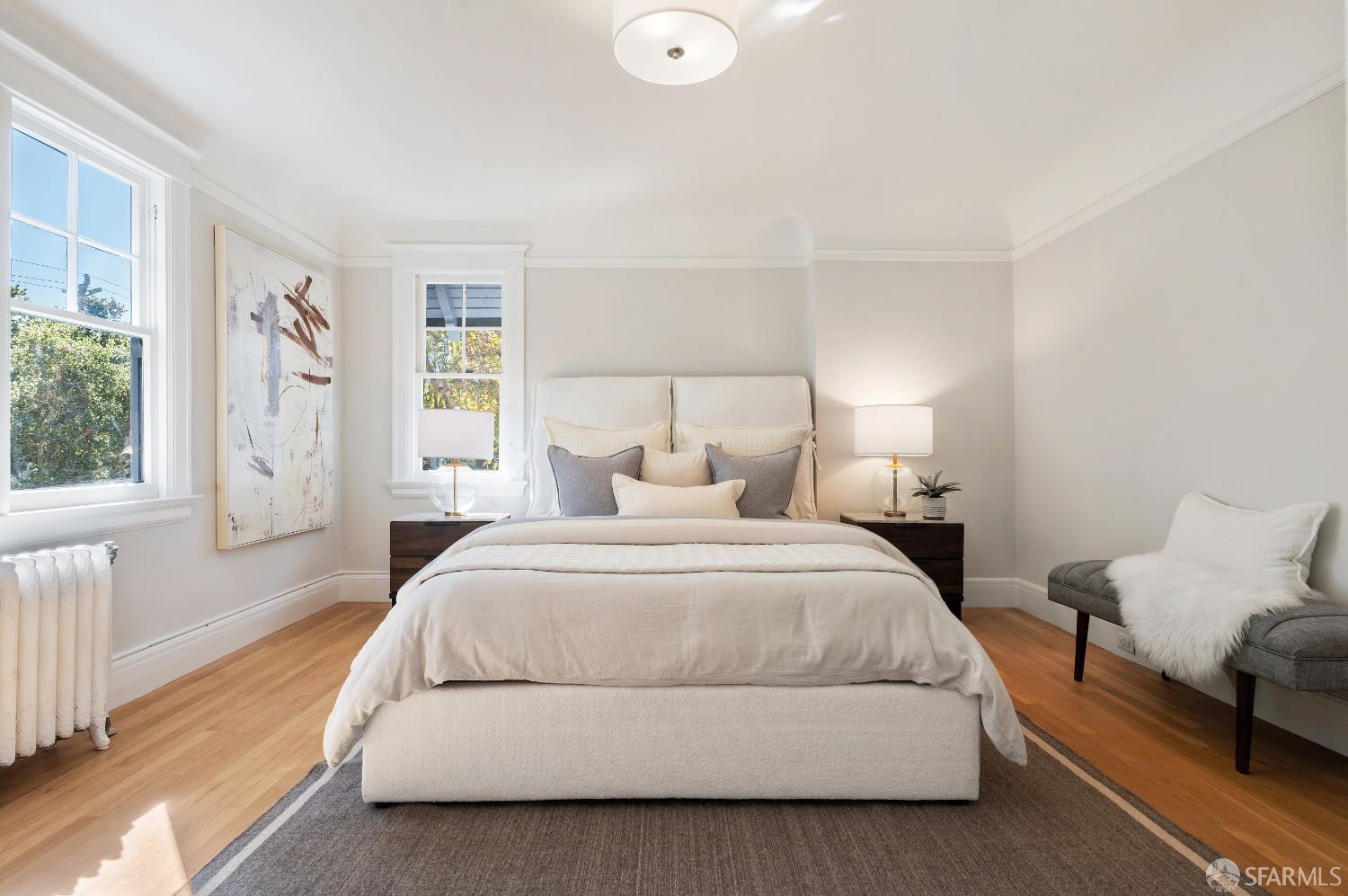 1616 Adeline Drive Burlingame, CA 94010 - Photo 28 of 67 a spacious bedroom with a bed and a couch