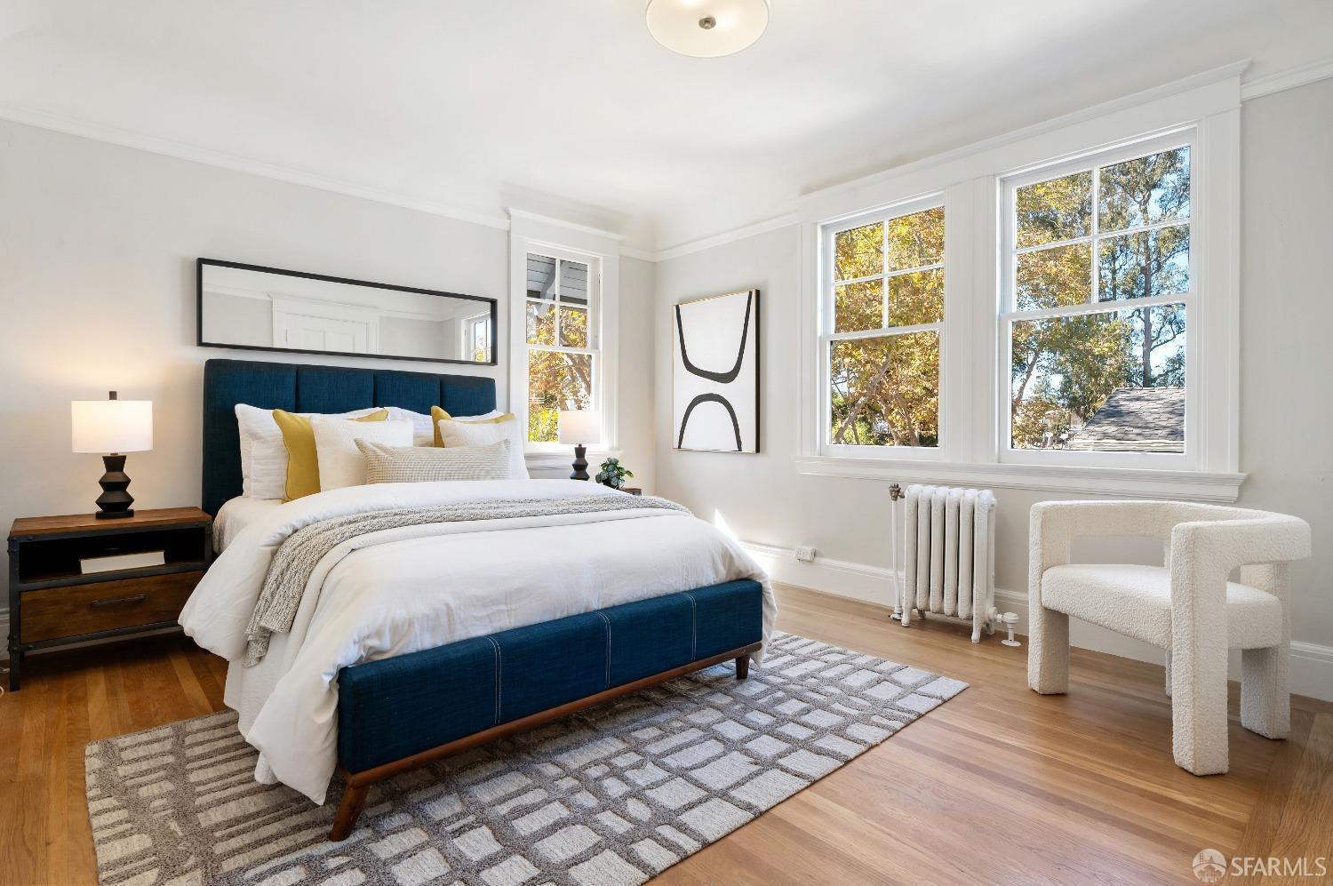 1616 Adeline Drive Burlingame, CA 94010 - Photo 29 of 67 a bedroom with a bed a lamp and a large window