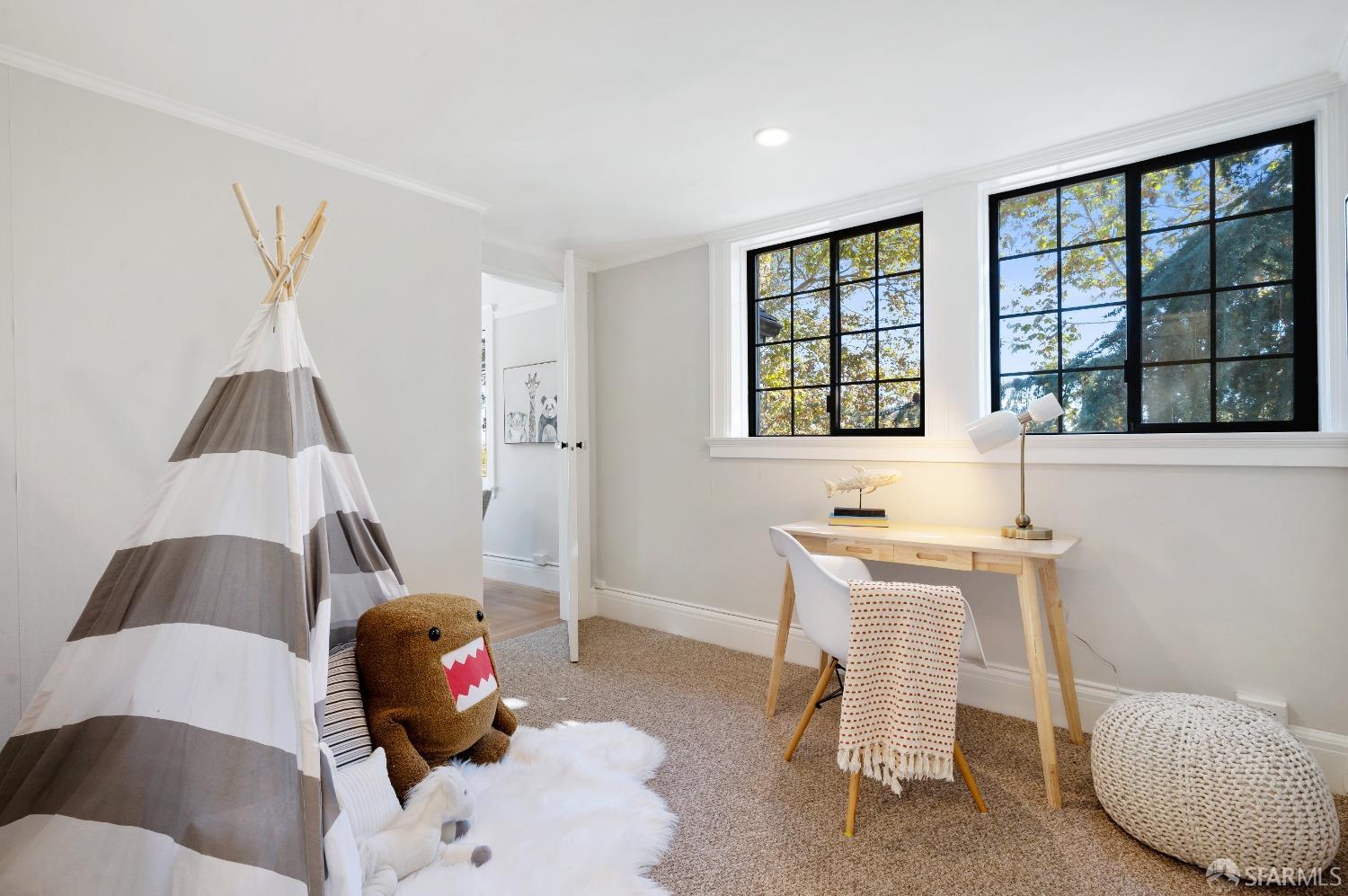 1616 Adeline Drive Burlingame, CA 94010 - Photo 36 of 67 a living room with furniture and a window