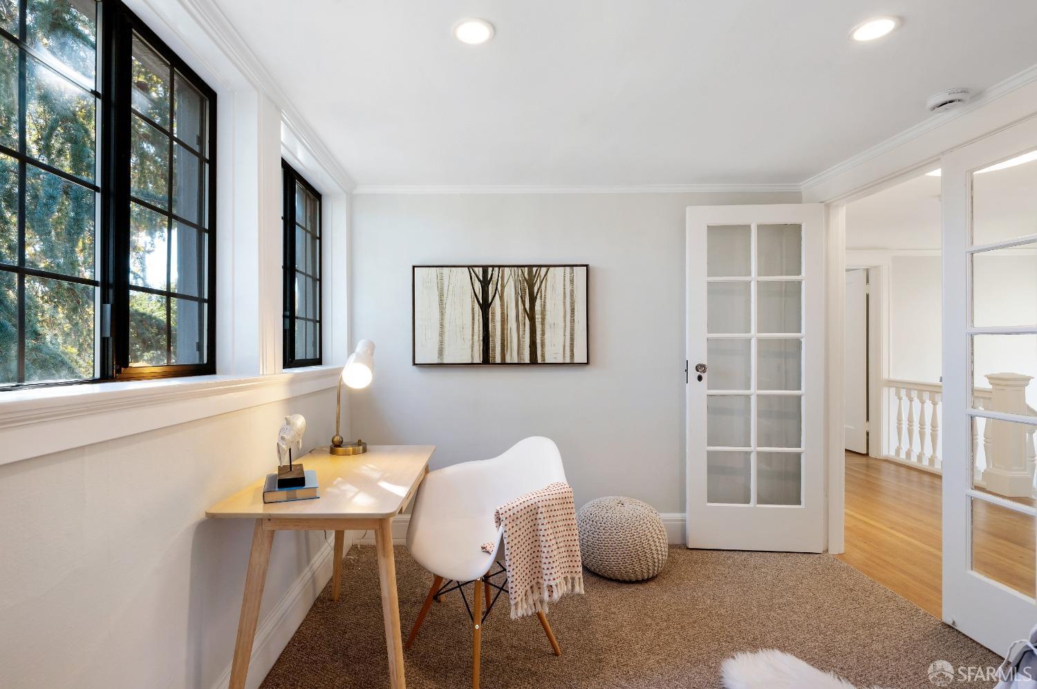 1616 Adeline Drive Burlingame, CA 94010 - Photo 37 of 67 a living room with furniture and a window