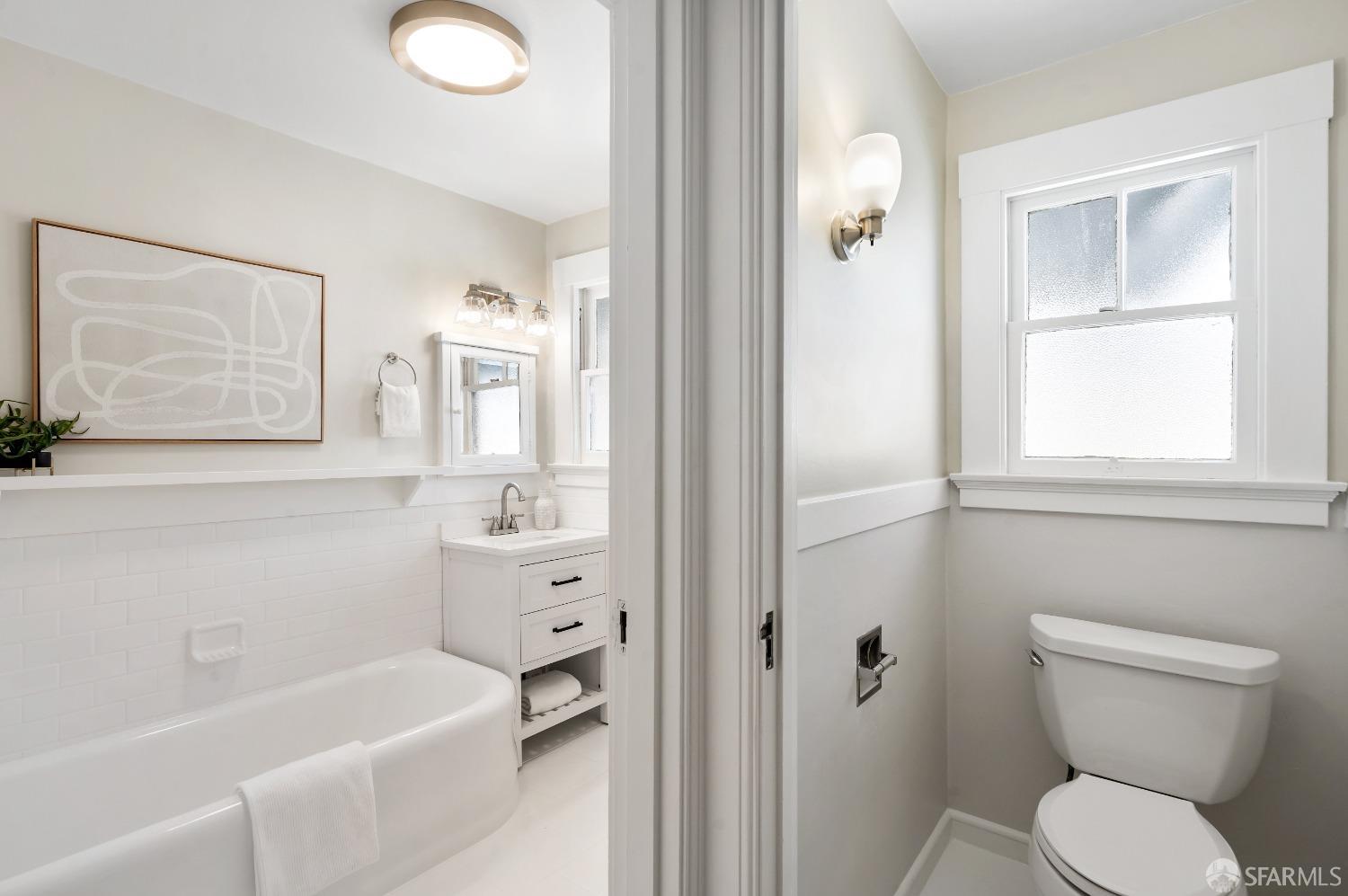 1616 Adeline Drive Burlingame, CA 94010 - Photo 43 of 67 a bathroom with a toilet a sink and bathtub