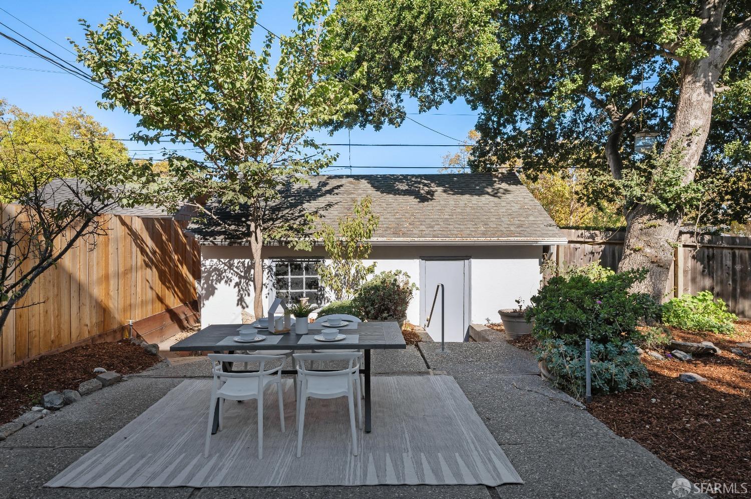 1616 Adeline Drive Burlingame, CA 94010 - Photo 52 of 67 a view of a patio with table and chairs and potted plants