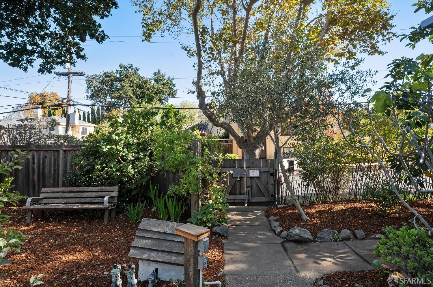 1616 Adeline Drive Burlingame, CA 94010 - Photo 57 of 67 a backyard of a house with barbeque oven fire pit and outdoor seating