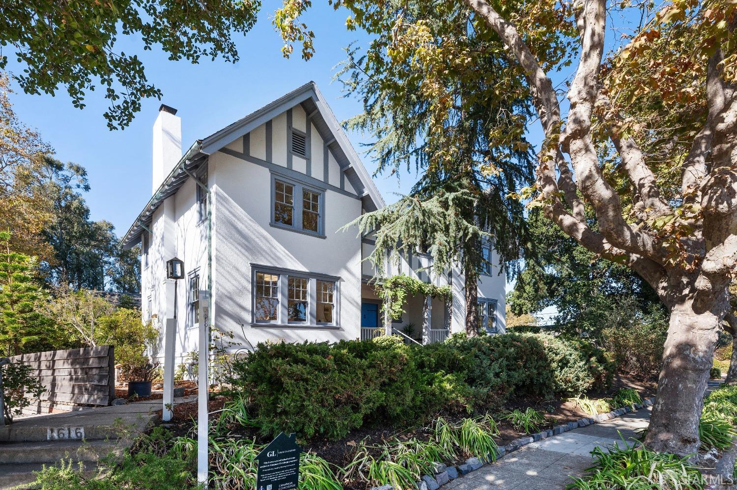 1616 Adeline Drive Burlingame, CA 94010 - Photo 66 of 67 a front view of a house with a yard and tree