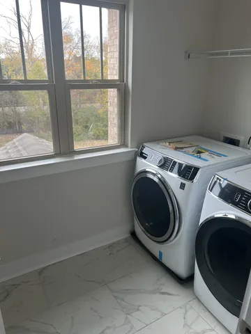 a brick house with a yard