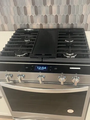 a bathroom with a toilet and a sink