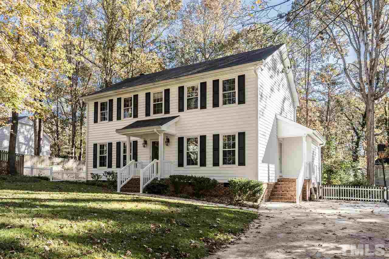 7212 St Ledger Drive Raleigh, NC 27613 - Photo 1 of 27 a front view of a house with a yard