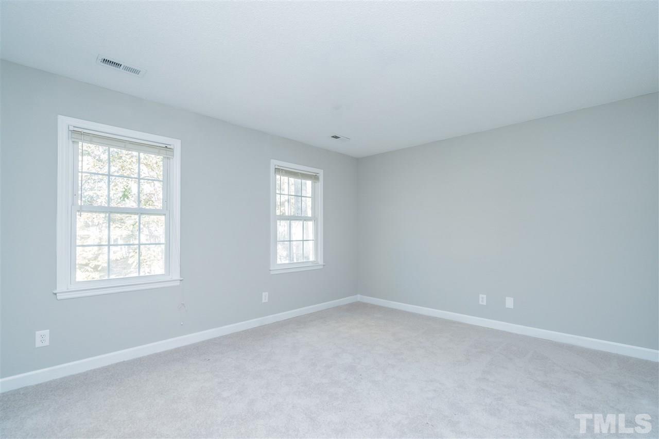 7212 St Ledger Drive Raleigh, NC 27613 - Photo 16 of 27 an empty room with a window