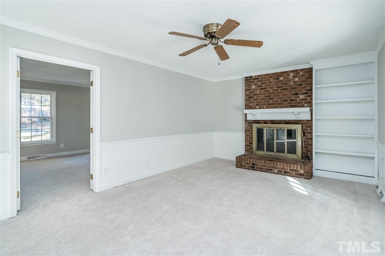 7212 St Ledger Drive Raleigh, NC 27613 - Photo 8 of 27 a view of livingroom with hardwood floor and a ceiling fan