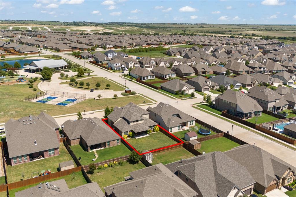 15105 Fleet Hill Road Aledo, TX 76008 - Photo 30 of 31 an aerial view of a residential houses with outdoor space and parking