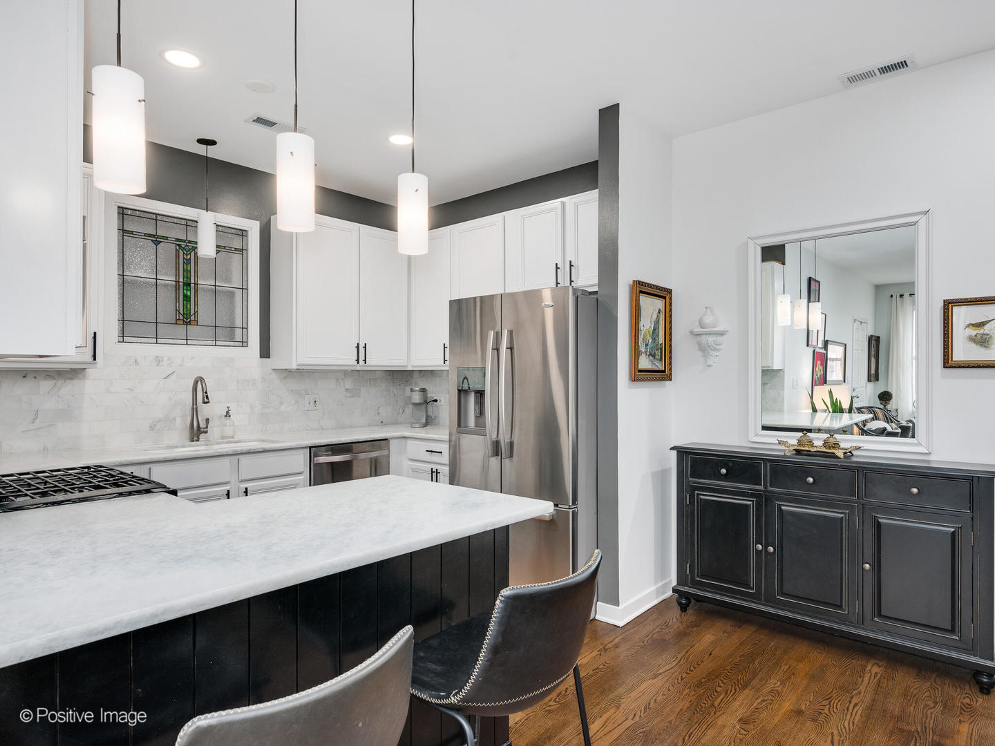 1349 West Fillmore Street, Unit B Chicago, IL 60607 - Photo 11 of 19 a kitchen with stainless steel appliances a sink stove and refrigerator
