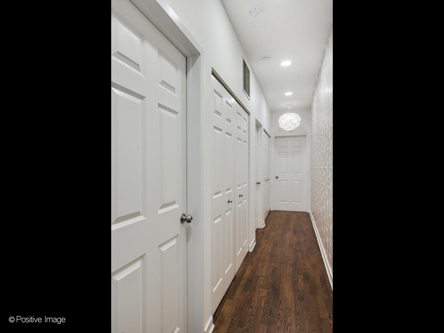 1349 West Fillmore Street, Unit B Chicago, IL 60607 - Photo 12 of 19 a view of a hallway with wooden floor and staircase