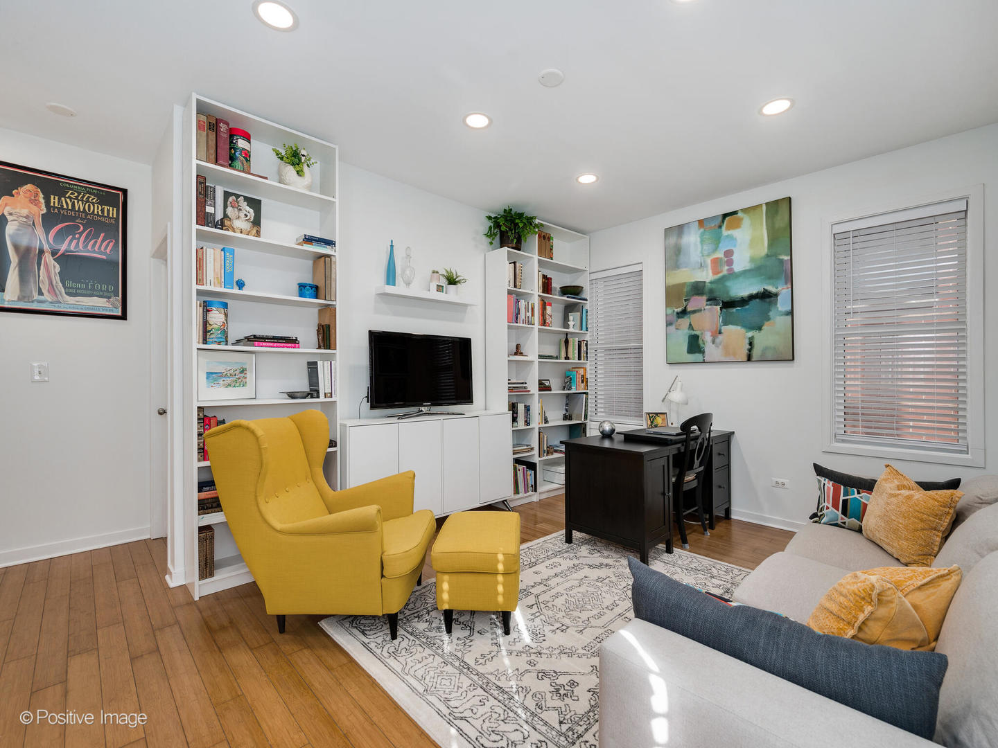 1349 West Fillmore Street, Unit B Chicago, IL 60607 - Photo 15 of 19 a living room with furniture and a flat screen tv