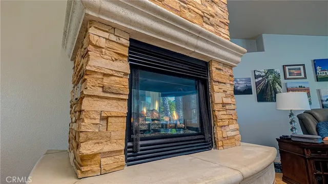 a kitchen with stainless steel appliances a sink stove and cabinets