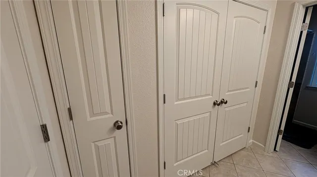 a front view of house with yard and swimming pool